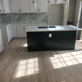 Kitchen with a center island and a light oak floor