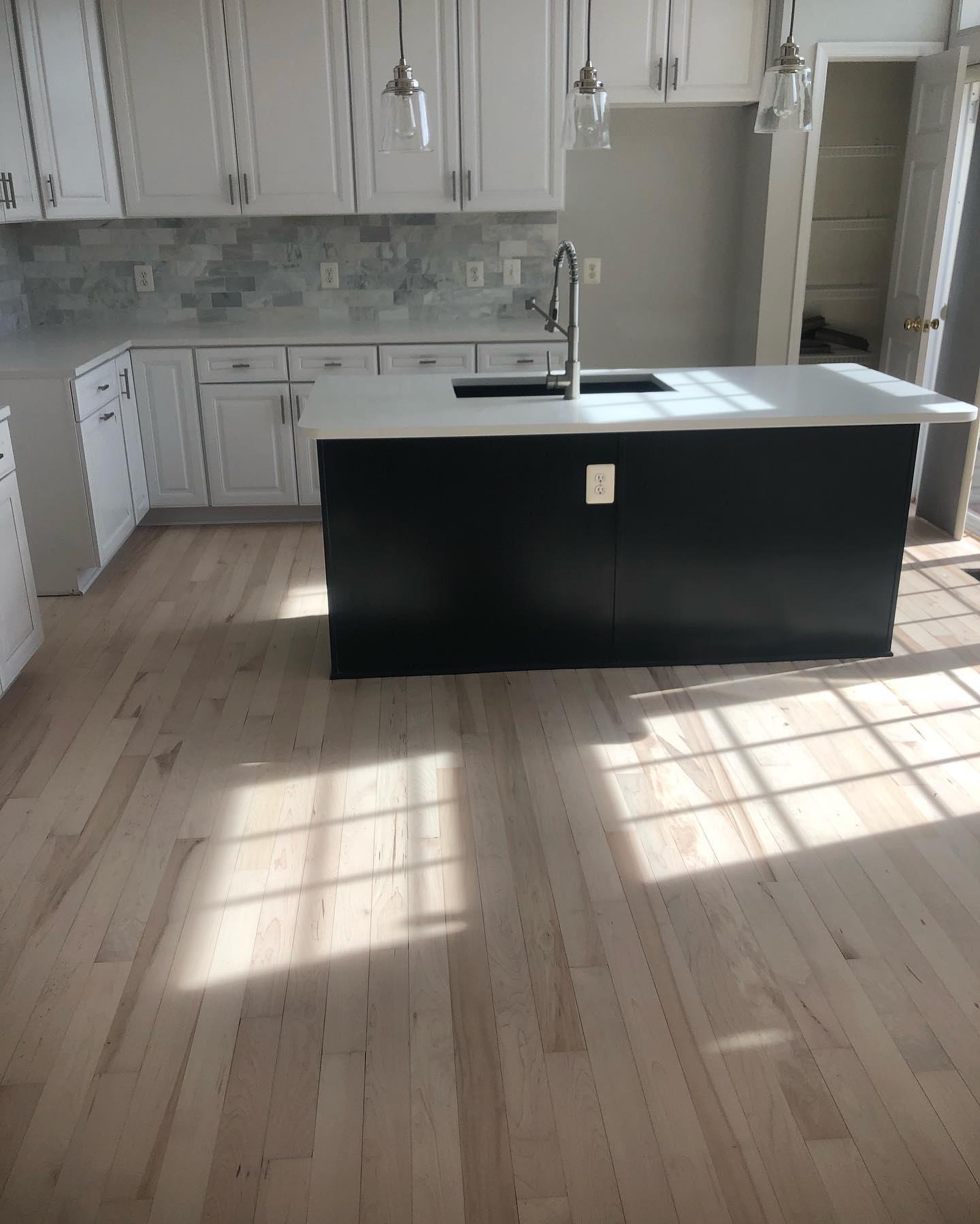 Hardwood Floors in the Kitchen: Pros, Cons, and Waterproof Alternatives